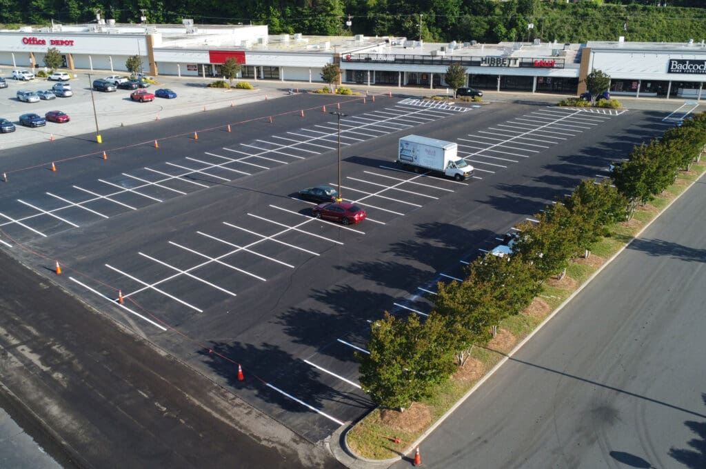 expansion of parking lot with asphalt paving
