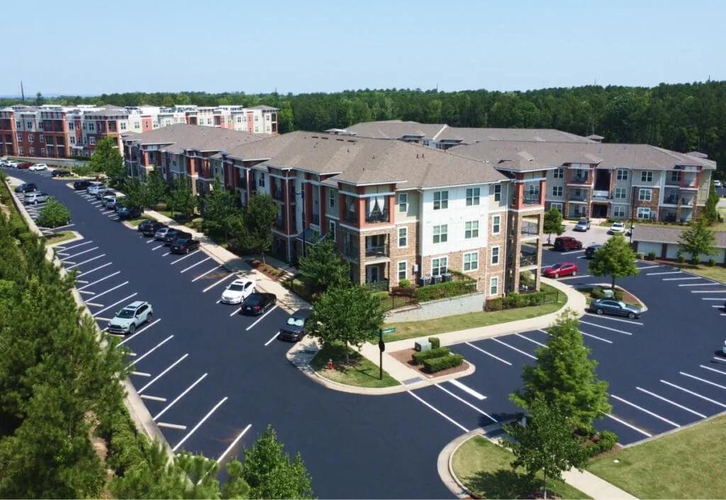 overhead image of apartment complex parking lot and street