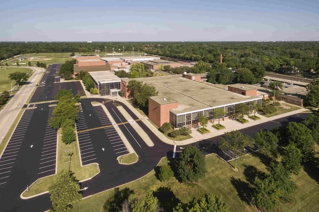 aerial view of a parking lot and school