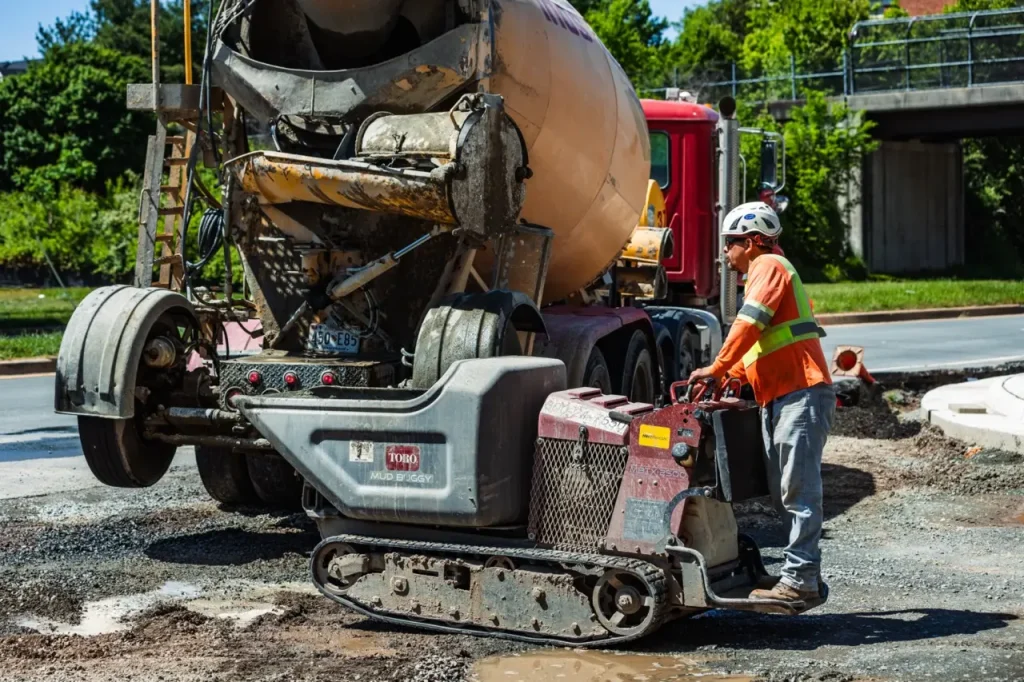 concrete contractor operating a concrete mix truck