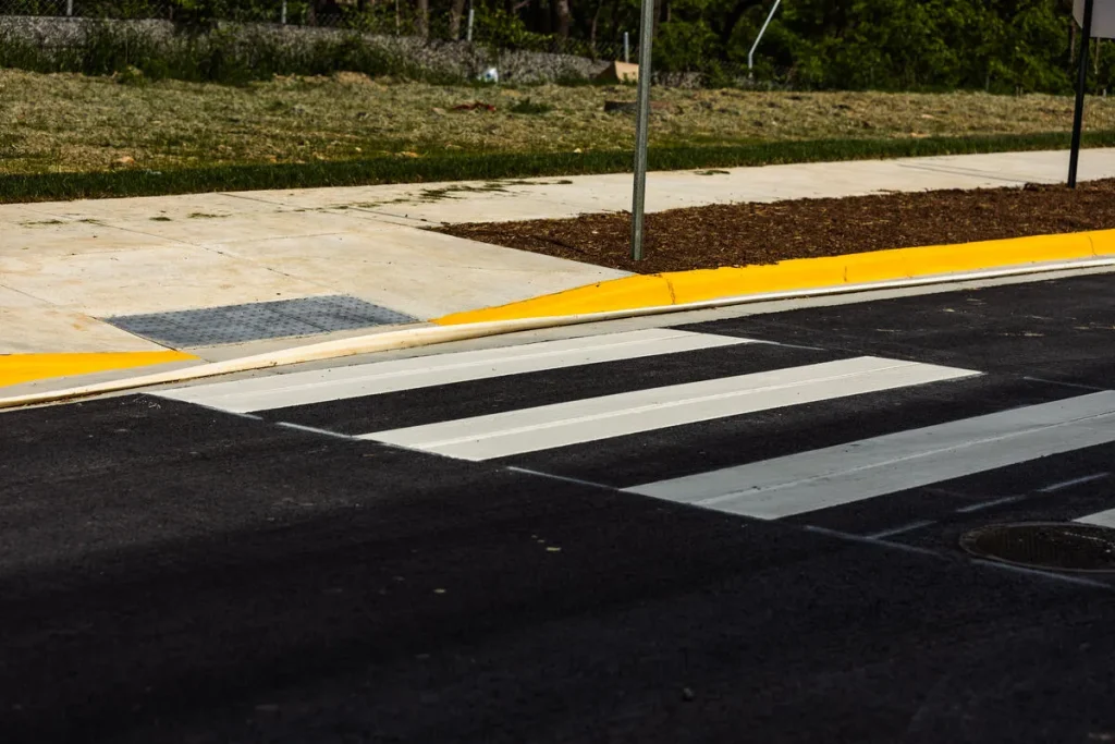 newly paved and painted pedestrian crosswalk
