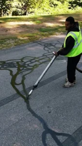 pave america employee crack sealing pavement