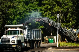 cold planer adding millings to a truck