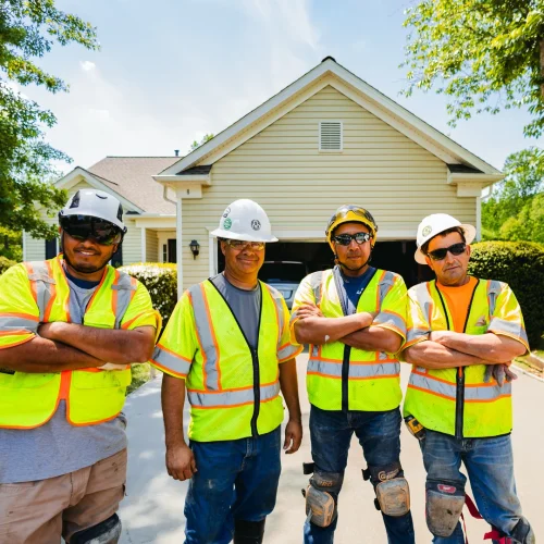 Brothers paving employees posing for the camera