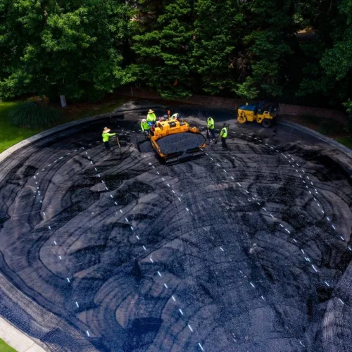 blackjack paving employees working on a cul-de-sac