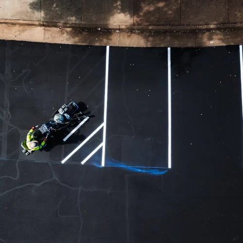 Blue Curb, LLC on site doing line striping in Manassas, VA