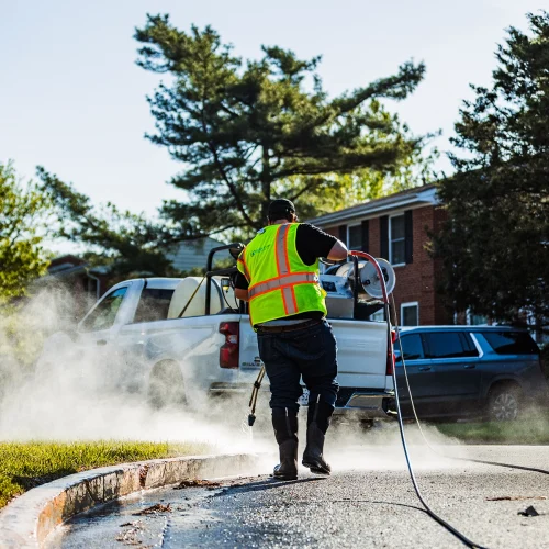Blue Curb, LLC power washes a property in Sterling, VA