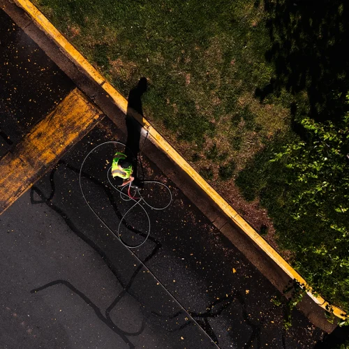 Blue Curb, LLC power washes a property in Sterling, VA