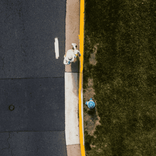 Blue Curb, LLC on site doing line striping in Manassas, VA