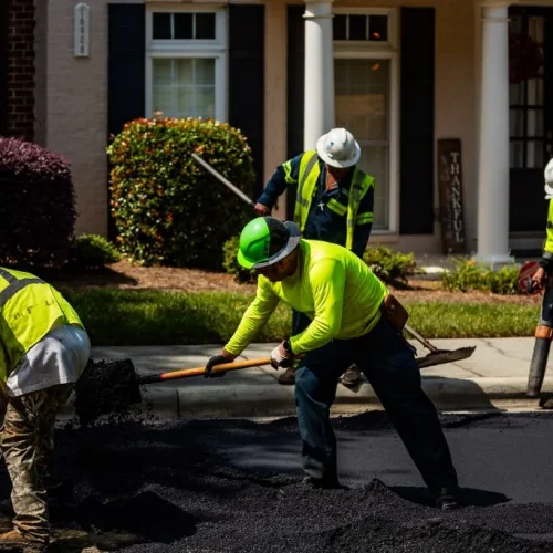 Carolina Asphalt employees on site at a commercial paving job.