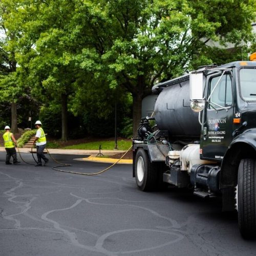 Dominion Paving employees paving street.