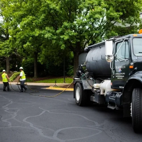 Dominion Paving employees paving street.