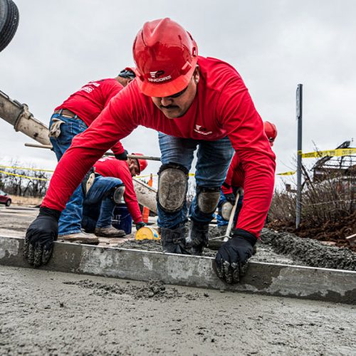 Close up of Encore Pavement employee working.