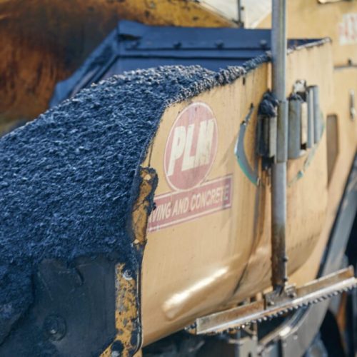 PLM Paving & Concrete brand on machine.