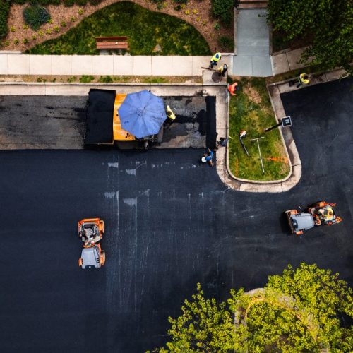 aerial view of pro pave working on a street