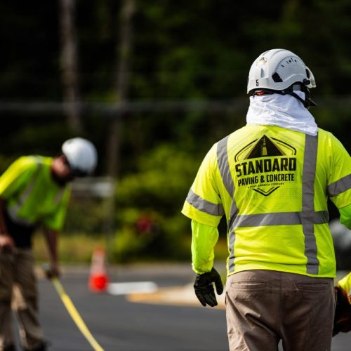 Standard Pavement & Concrete employees working on job site.