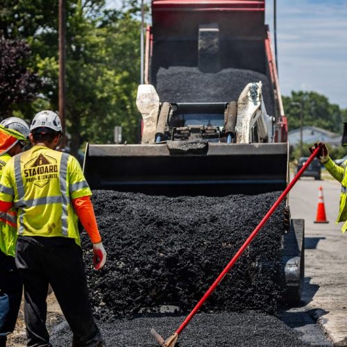 Standard Pavement & Concrete employees working on job site.