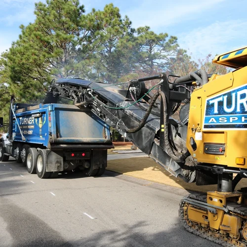 Turner Asphalt equipment on commercial job site.