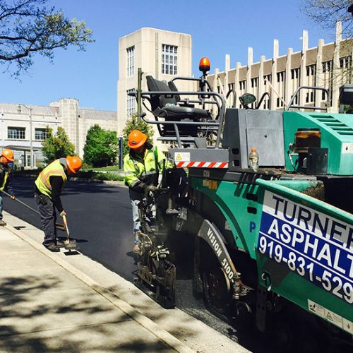 Turner Asphalt employees working on commercial job site.