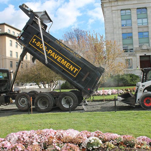 US Pavement Services truck unloading.