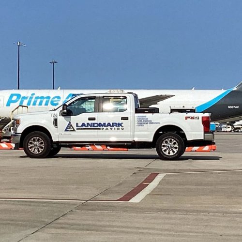 Landmark Paving truck at airport.