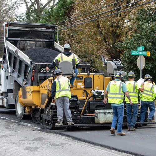 BAC employees working on a street