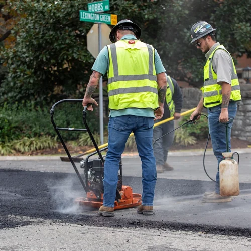 BAC Paving employees laying asphalt